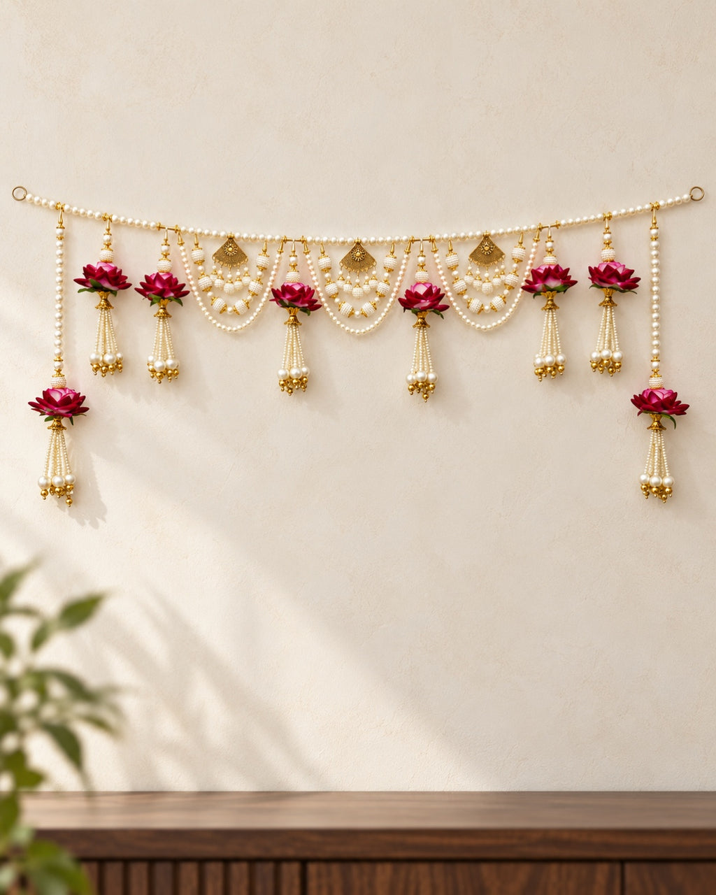Gulabi Rose Pearl Swag Toran - full product on a cream wall