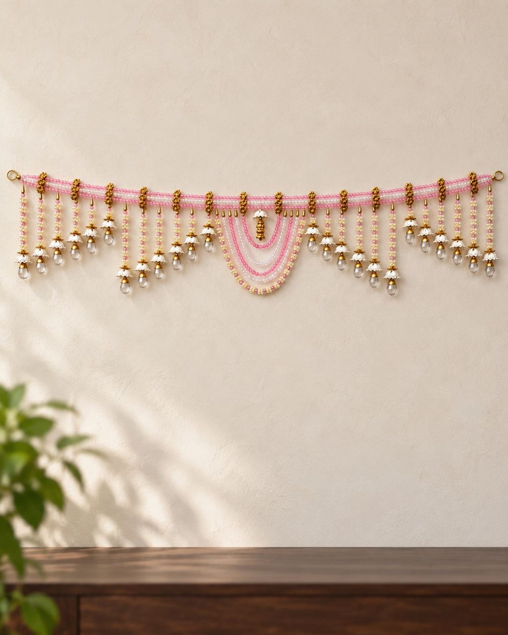 Blush Pearl Cascade Toran - full product on a cream wall