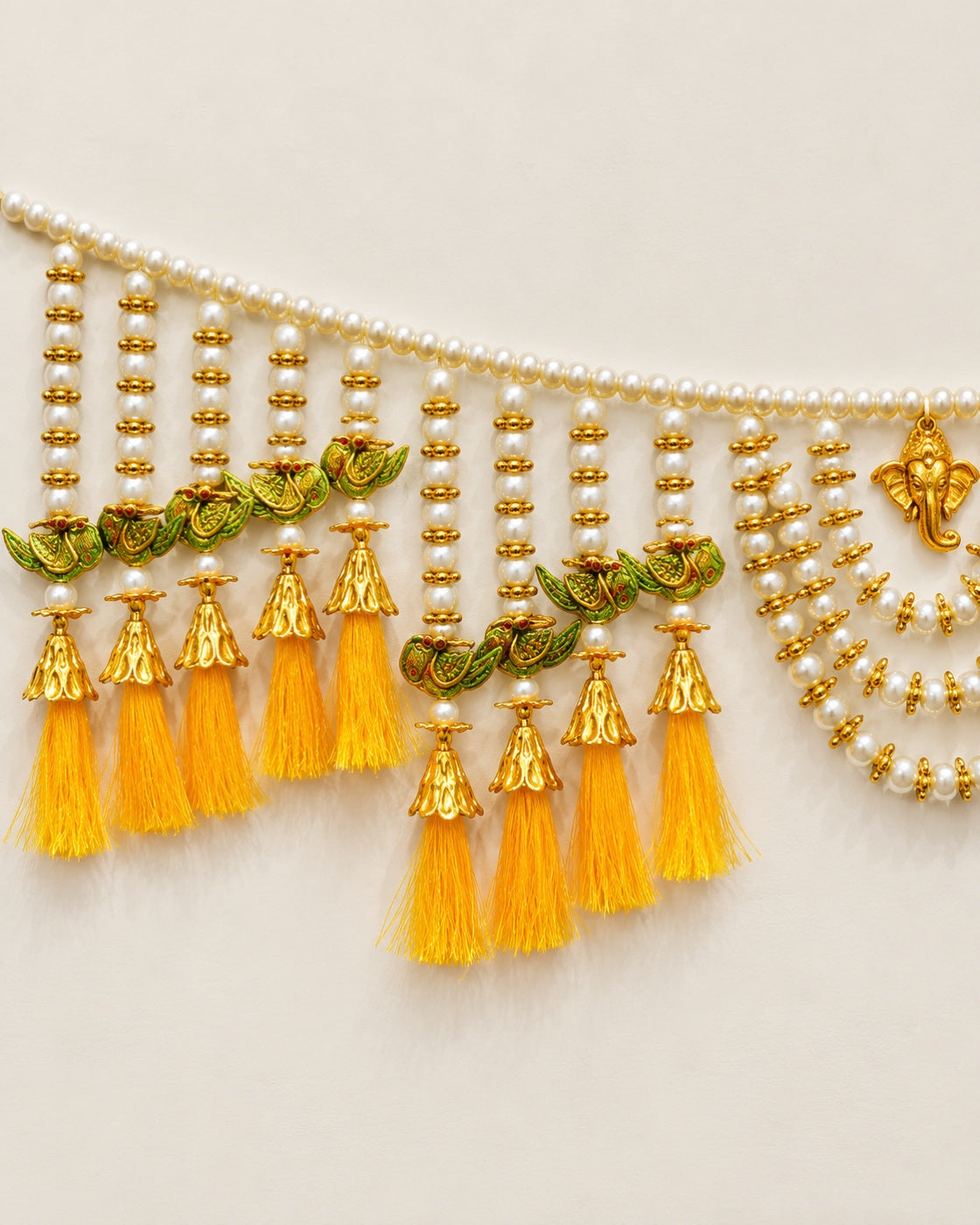 Peacock Yellow Tassel Toran - close-up of decorative details